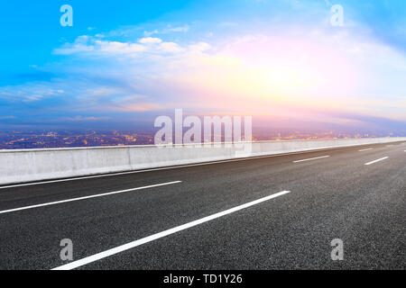 Empty highway road and modern city skyline in Shanghai,China Stock Photo