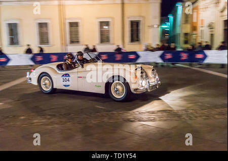 1954 Jaguar XK140 OTS SE Roadster  sports car, Mille Miglia classic car rally, Piazza del Popolo, Ravenna, Emilia-Romagna, Italy Stock Photo