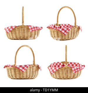 Set of wicker picnic baskets shot from different angles. Isolated on white. Stock Photo