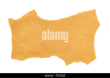 A piece of torn brown craft paper, shot from above on a white background with copy space Stock Photo