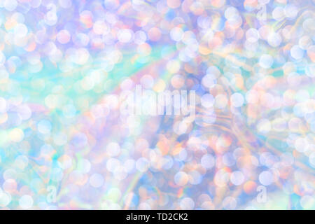 Modern beautiful holographic background of holiday lights bokeh. Trendy 80's style. Wallpaper design. Stock Photo