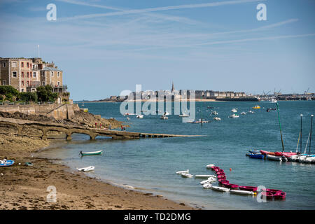 View from Promenade du Clair de lune in Dinard with St Malo across estuary in the background, Brittany, France Stock Photo