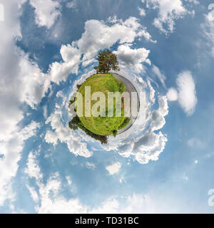 Little planet transformation of spherical panorama 360 degrees. Spherical abstract aerial view in field in nice day with awesome beautiful clouds. Cur Stock Photo