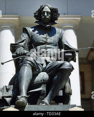 Spain. Madrid. Bronze statue of painter Diego Velazquez(1599-1660) at the main entrance of Prado Museum. By Aniceto Marinas in 1899. Stock Photo