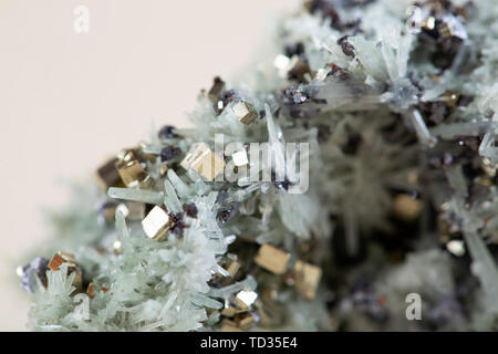 Pyrite on white background, also known as iron pyrite and fools gold Stock Photo