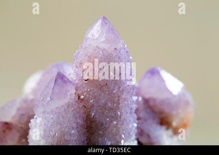 Pretty Sparkle Amethyst Spirit Quartz cluster from South Africa, isolated on white background Stock Photo