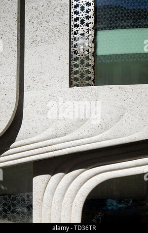 Detail view of stone curves and bronze window metalwork. Qatar Airways Headquarters, London, United Kingdom. Architect: PLP Architecture, 2019. Stock Photo