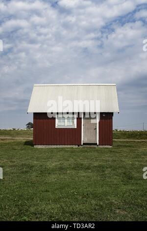 Red barn roof with bright blue sky Stock Photo - Alamy