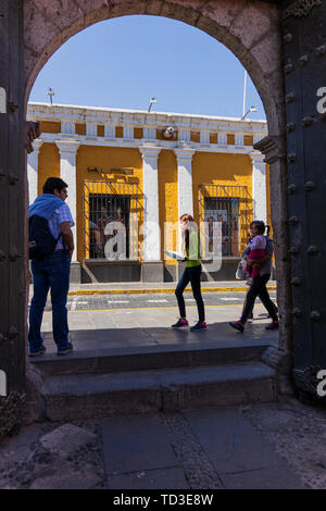 Looking out the arched entrance to the Monasterio de Santa Catalina, Arequipa, Peru, South America Stock Photo