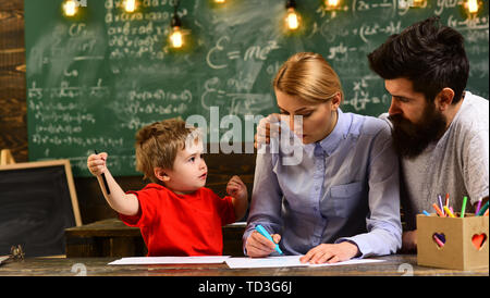 E-Learning concept with student holding his modern laptop computer, Tutor needs to be enthusiastic and needs to like his subject, Teacher drawing at Stock Photo
