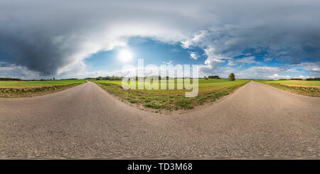 360 degree panoramic view of Full spherical seamless panorama 360 degrees angle view on no traffic asphalt road among alley and fields with awesome clouds in equirectangular equid