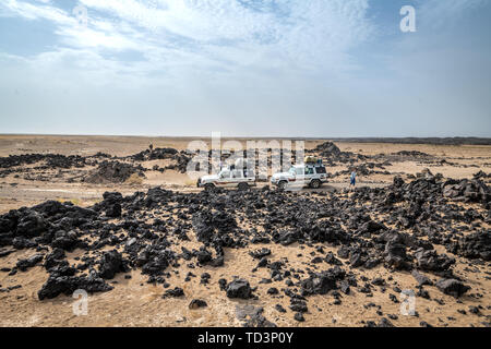 Rocky desert surrounding the Erta Ale Volcano in the Afar Region of Ethiopia Stock Photo