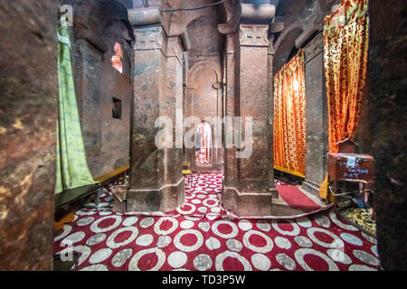 Rock hewn monolithic church of Bet Golgotha (House of Golgotha Mikael), known for its arts and said to contain the tomb of King Lalibela) in Lalibela  Stock Photo