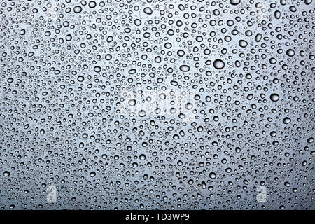 background of water drops on brushed metal surface Stock Photo
