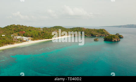 aerial drone: Sandy beach and turquoise water in the tropical resort of Boracay, Philippines, Ilig Iligan Beach. Summer and travel vacation concept. Stock Photo