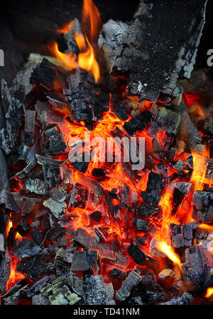 Closeup of live coals natural background Stock Photo