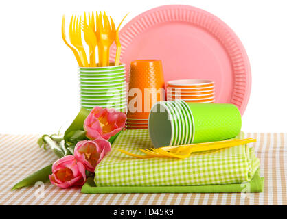 Multicolored plastic tableware isolated on white Stock Photo