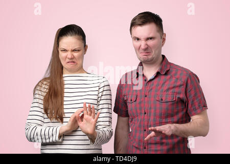 woman and man denying, rejecting proposition, refusing bad deal offer Stock Photo