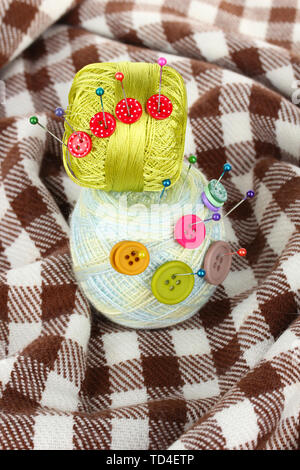 Buttons of different colors, and the two tangle thread Stock Photo