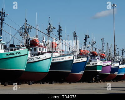 SHIPPAGAN, NEW BRUNSWICK, CANADA - August 24, 2017: Commercial fishing boats lined up in dry dock during a closed season Stock Photo