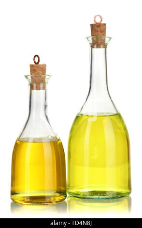 Original glass bottles with salad dressing isolated on white Stock Photo