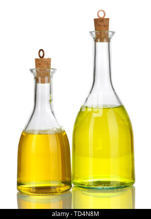 Original glass bottles with salad dressing isolated on white Stock Photo