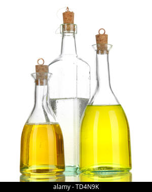 Original glass bottles with salad dressing isolated on white Stock Photo