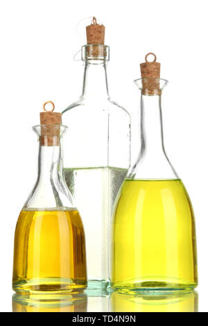 Original glass bottles with salad dressing isolated on white Stock Photo