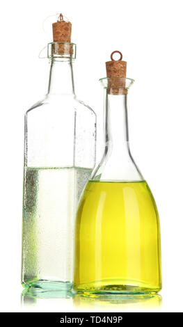 Original glass bottles with salad dressing isolated on white Stock Photo