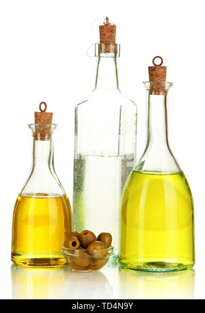 Original glass bottles with salad dressing isolated on white Stock Photo