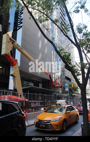 New York, USA. 11th June, 2019. The exterior facade of the New York Museum of Modern Art (MoMA), which is currently undergoing renovation. The MoMA is one of New York's most popular attractions. Around three million visitors squeeze their way through the art museum in long queues every year. An expansion is supposed to bring more space - but for that the MoMA has to close for four months now. Credit: Christina Horsten/dpa/Alamy Live News Stock Photo
