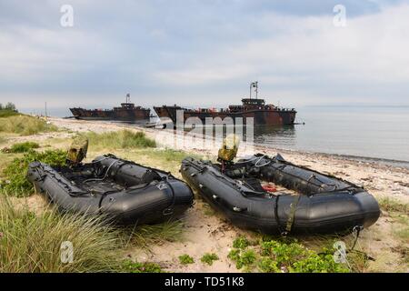 11.06.2019, since Monday the 10th of June the British Royal Navy manages amphibious warfare with the landing craft of the HMS Albion in the northern Eckernforder bay near the campsite Gut Ludwigsburg near Langholz as part of the Manovers BALTOPS 2019. LCU Mk 10 L9732 and L9734 with open ramps on the bow and two inflatable boats in the front gurnd. | usage worldwide Stock Photo