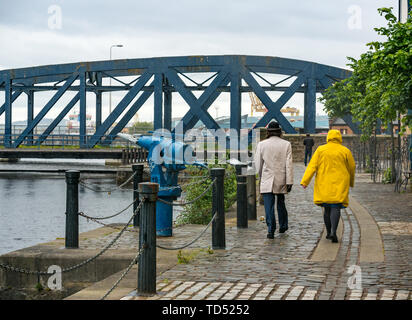 The Shore, Leith, Edinburgh, Scotland, United Kingdom, 12th June 2019. UK Weather: A June washout with an unseasonal cold rainy and windy day in the Capital's dock area Stock Photo