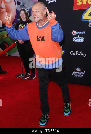 Hollywood, USA. 11th June, 2019. HOLLYWOOD, LOS ANGELES, CALIFORNIA, USA - JUNE 11: Musician Flea arrives at the Los Angeles Premiere Of Disney And Pixar's 'Toy Story 4' held at the El Capitan Theatre on June 11, 2019 in Hollywood, Los Angeles, California, USA. (Photo by David Acosta/Image Press Agency) Credit: Image Press Agency/Alamy Live News Stock Photo