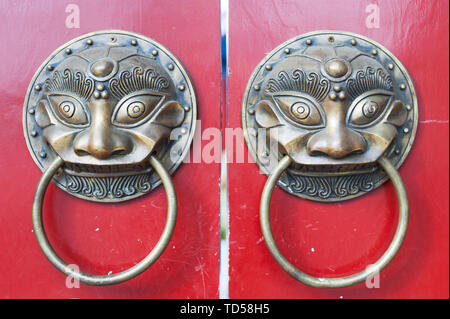 Chinese classical wooden door copper Ruianimal copper ring Stock Photo