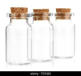 Empty little bottles with cork stopper isolated on white Stock Photo