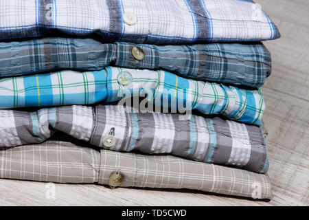 Shirts neatly folded close-up Stock Photo