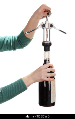 Opening of red wine corkscrew isolated on white Stock Photo