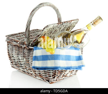 Picnic basket with grape and bottle of wine, isolated on white Stock Photo