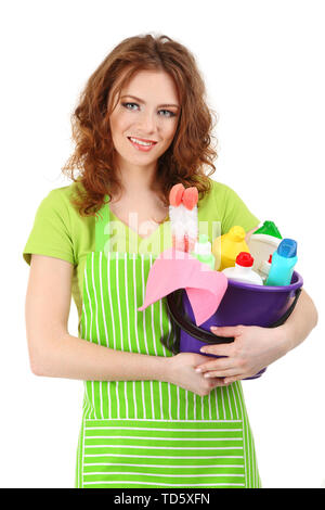 Female cleaner holding bucket with cleaning supplies isolated on white Stock Photo