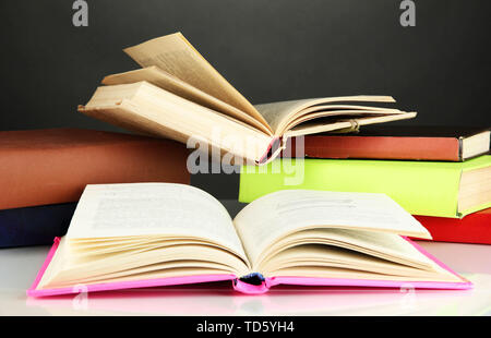 Stack of books on gray background Stock Photo