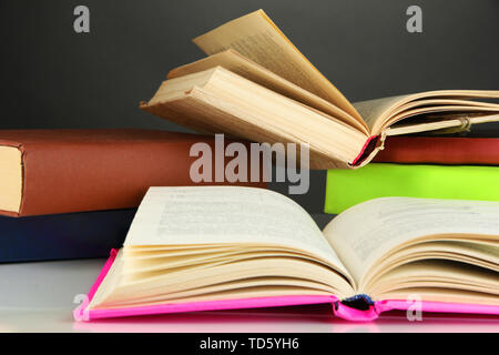 Stack of books on gray background Stock Photo