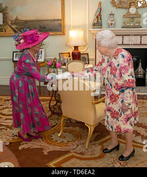 Queen Elizabeth II with Dame Marguerite Pindling and her family upon ...