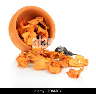 Assorted dried fruits in wooden bowl isolated on white Stock Photo