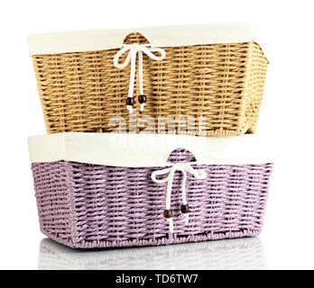 Two empty color wicker baskets, isolated on white Stock Photo
