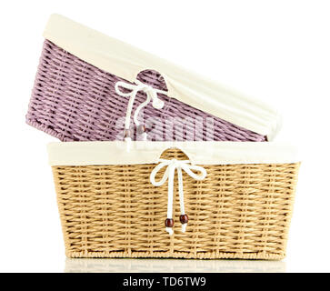 Two empty color wicker baskets, isolated on white Stock Photo