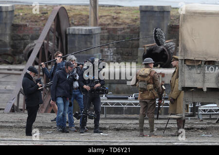 Actor George Mackay and Mark Strong on set of Sam Mendes (L)new film 1917 during filming at Govan Docks in Glasgow.PRESS ASSOCIATION Photo. Picture date:Tuesday June 12, 2019. Photo credit should read: Andrew Milligan/PA Wire Stock Photo