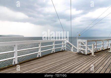 Sopot Pier - built as a pleasure pier and as a mooring point for cruise boats, first opened in 1827. At 511.5m - the longest wooden pier in Europe. Stock Photo