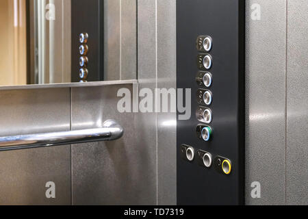 Tactile digit icons for the visually impaired. Elevator buttons. Selective focus close-up Stock Photo