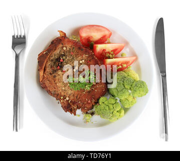 Piece of fried meat on plate isolated on white Stock Photo